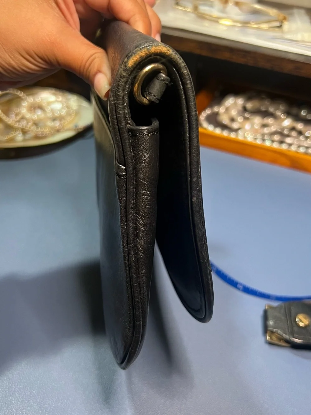 Pre-loved Tory Burch Black Leather clutch with Gold hardware